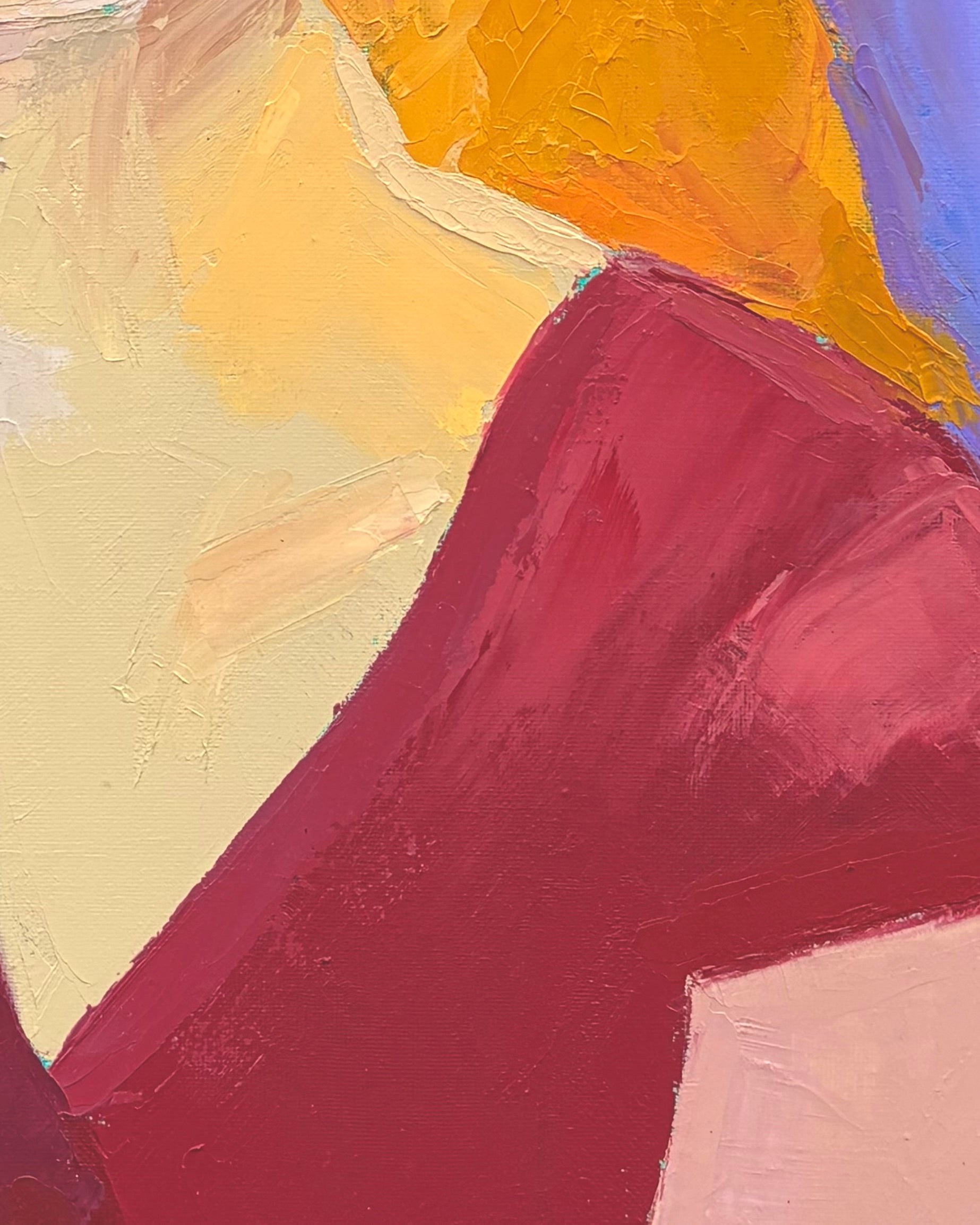 Zoomed in section of a painting of a person with blond hair and red top